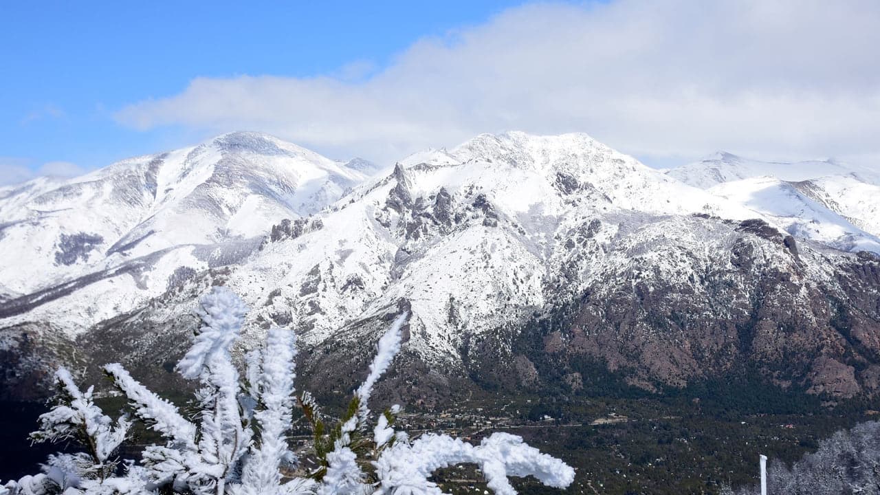 Snow covered peaks above Bariloche in clear winter light
