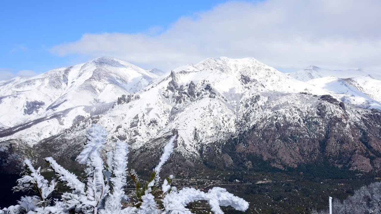 Snow covered peaks above Bariloche in clear winter light
