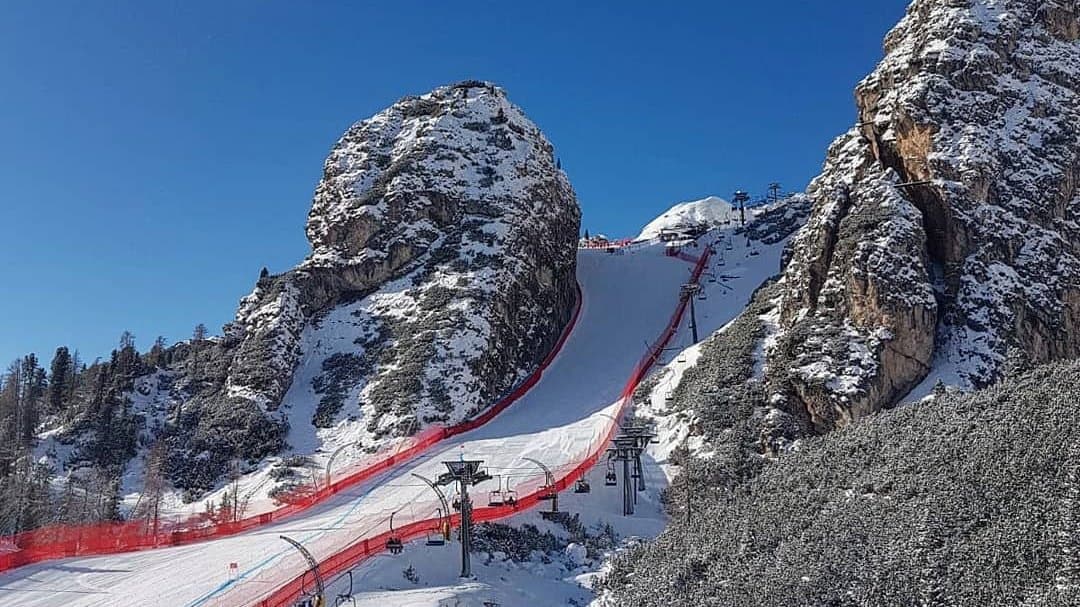 The World Cup downhill course between the rocks above Cortina, netted in red