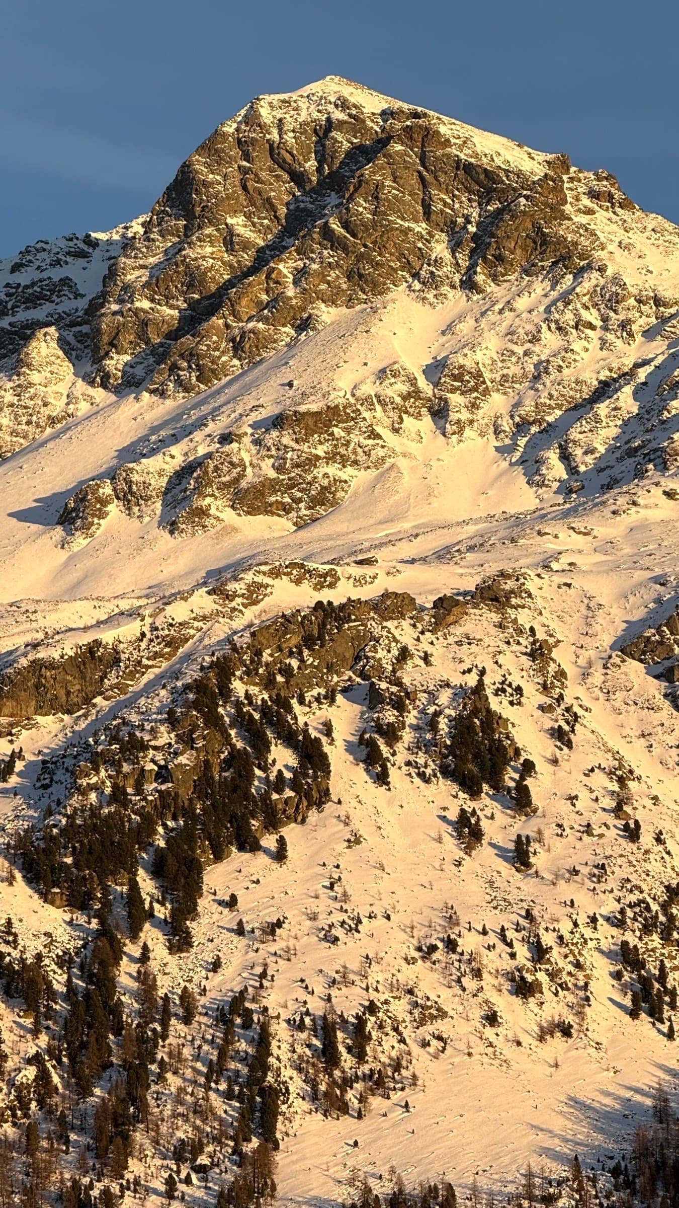 Skiers on a snowy ridge in the Argentine Andes