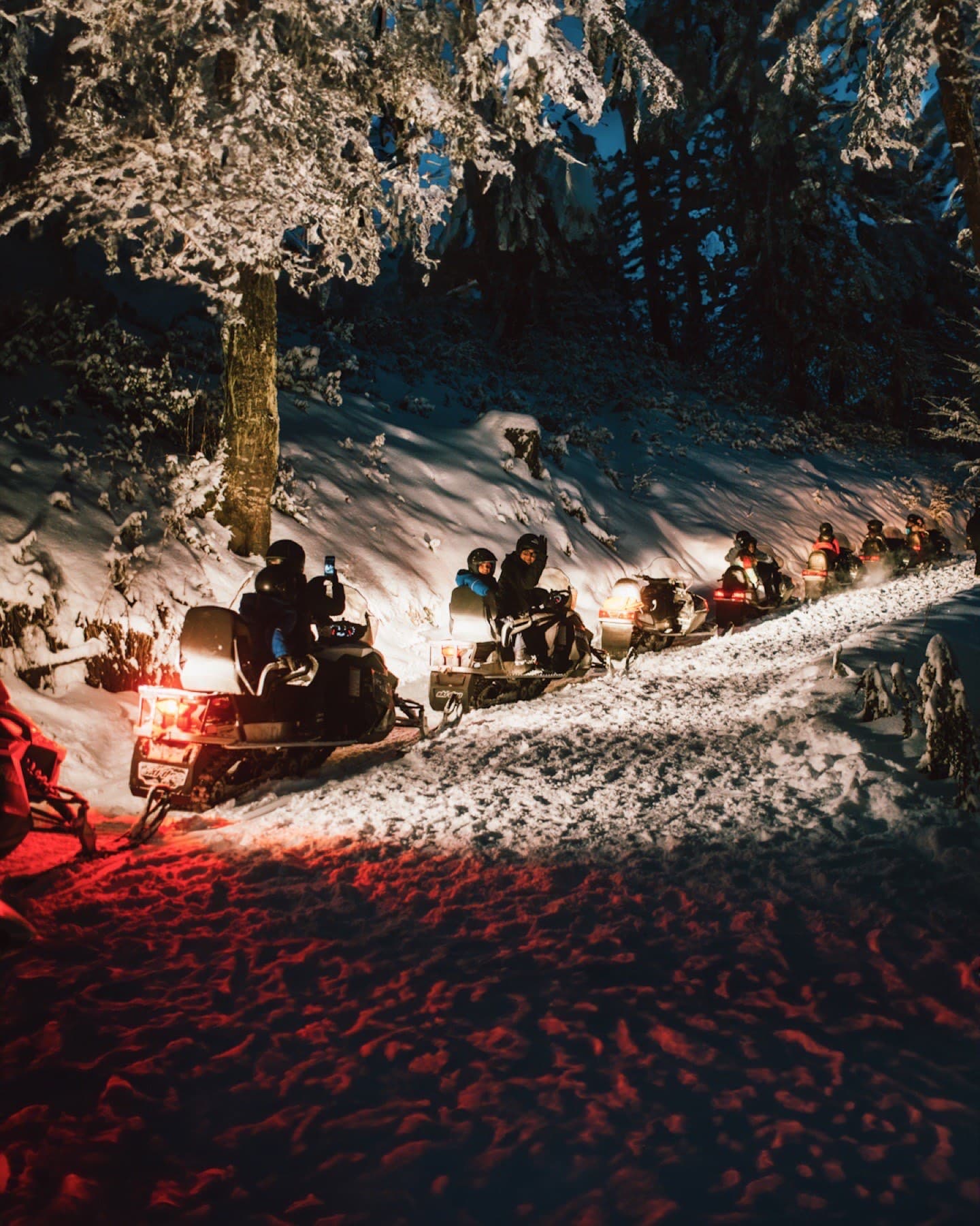 Skiers traversing an untracked slope