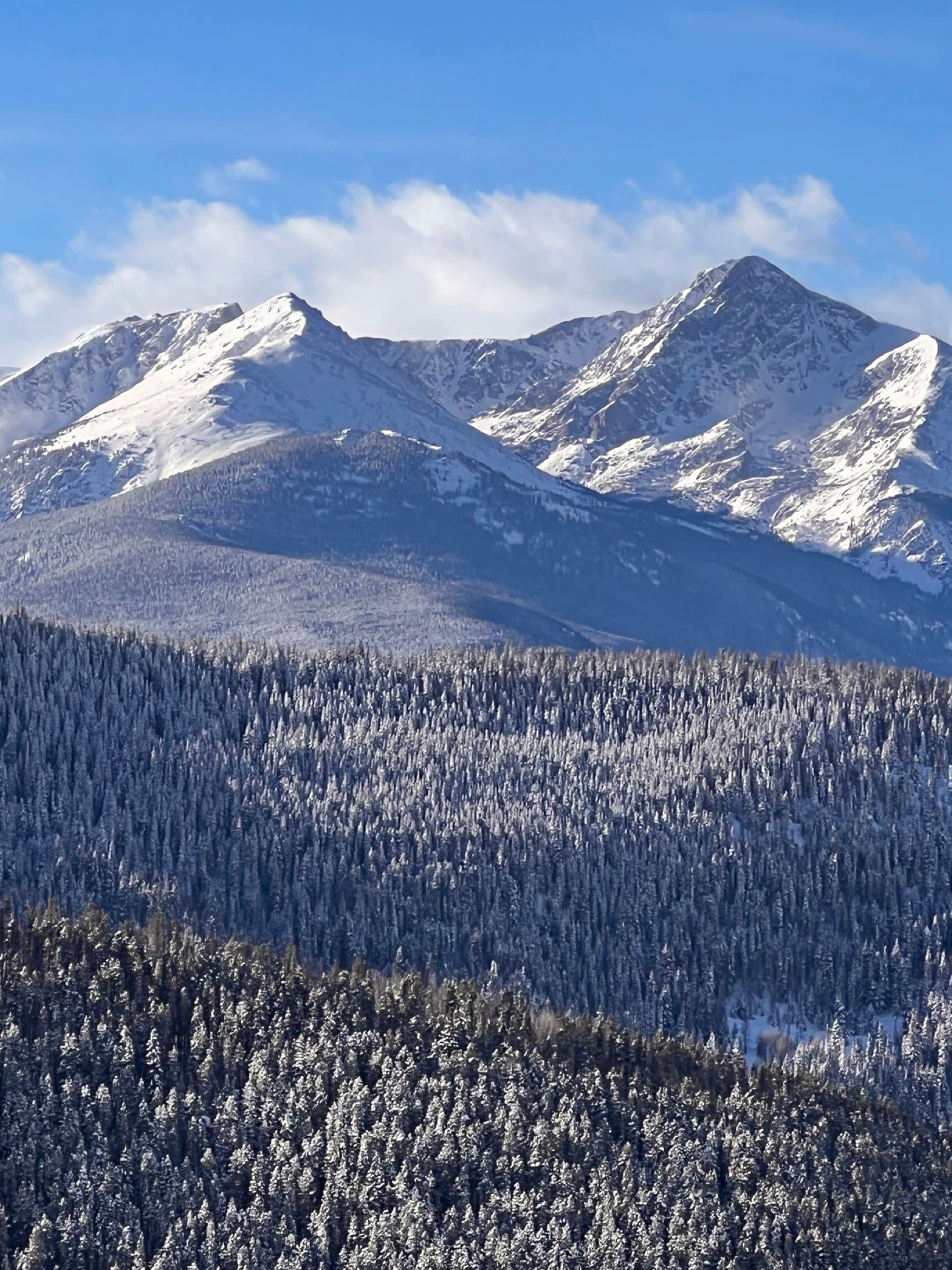Snow-covered peaks above a North American ski resort